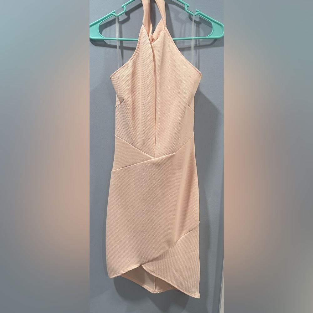 Size small in the color peach/cream